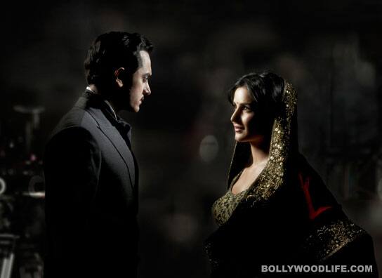 <b>Avinash Gowariker on Aamir Khan & Katrina Kaif</b>
This was shot for a coffee table book, 'Love and Longing in Hindi Cinema'. For the cover we had to recreate Guru Dutt and Waheeda Rehman from <i>Pyaasa</i>. We first did the cover shot, but this is my favourite one. Aamir and Katrina look like Aamir and Katrina. There is no doubt about that. But the picture has a mystical feel of Guru Dutt and Waheeda Rehman. I can’t explain it in words. We did not use any prosthetics to make Aamir look like Guru Dutt and Katrina like Waheeda Rehman. They just look like them. That was the beauty of it. When you keep this picture next to the original shot, it is very mindboggling. Their expressions are just bang on. There is a certain calmness about this frame that makes it mystical and beautiful. I love the way it is lit. It remains one of my favourites till date. <b>Aamir Khan’s styling: Aamir Bhasin | Katrina Kaif’s styling: Manish Malhotra | Makeup: Subbu</b>
