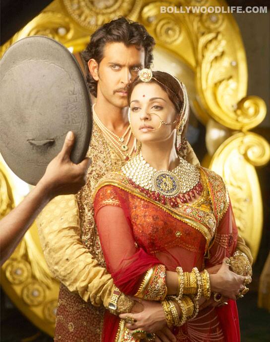 <b>Avinash Gowariker on Hrithik Roshan & Aishwarya Rai Bachchan</b>
It’s a moment of great characterisation. This was taken for the photoshoot of <i>Jodhaa Akbar</i>. Shooting was nearly complete and we wanted to do the photoshoot. Ashu (Ashutosh Gowariker) said let’s do it on the sets. I do this for a living, but I must confess I was in awe of this shoot. Because Hrithik and Aishwarya as Akbar and Jodhaa – that is not going to happen again. So the sheer power of it was too much for me, and I enjoyed that. The other part of it was that I had seen the rushes of the film. Kiran Deohans had shot it. Nitin Desai did the sets and Ashu, the  lighting. It had a look and feel which was absolutely phenomenal. I as a photographer had to match that and not on the sets either. It’s not film lighting. I have recreated this lighting with studio flash lights. So for me it was a huge challenge. When I took the shot on digital, Ashu and Kiran came and hugged me. This picture also symbolises the personalities of Hrithik and Aishwarya and not Jodhaa and Akbar. The calmness and confidence and the aura that Aishwarya has, and her beauty too, are obvious from the way she is looking into the mirror. The same with Hrithik. He is looking like a Greek god. And Hrithik’s character of doing everything perfectly is in this.

