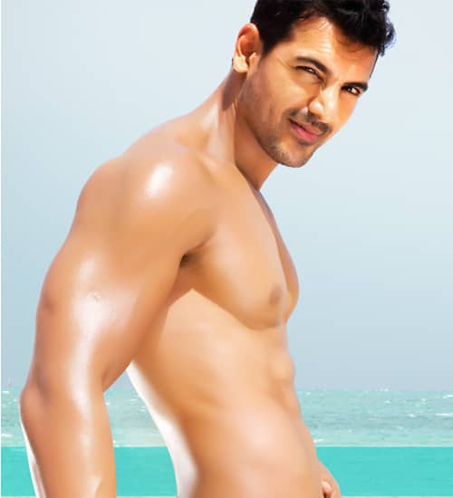 Beach boy John Abraham had guys and gals alike drooling over his abs in <i>Dostana</i>. Also over certain other parts of him. We like.
