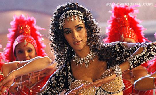 The sexy siren dressed in traditional gear in <i>Maan Gaye Mughal-e-Azam</i>. And Mallika managed to do a good job teaming the <i>topi</i> and <i>anarkali</i>. But in this song, she went a little overboard with the shiny stuff. The fake curls, stone studded blouse, embroidered sleeves, diamond neck-piece and similar headband killed it with overload. We know the Mughals loved their jewels, but festooning clothes is kinda pushing it.