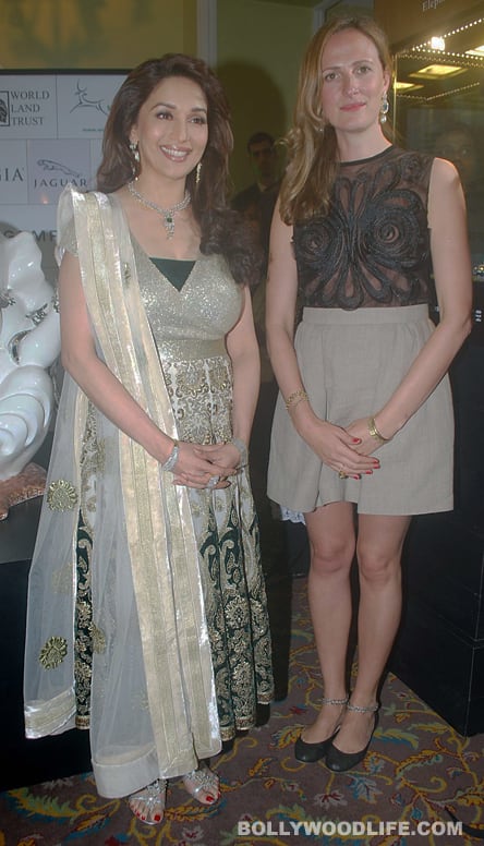 Madhuri Dixit Nene with an official from the jewellery brand she will now represent