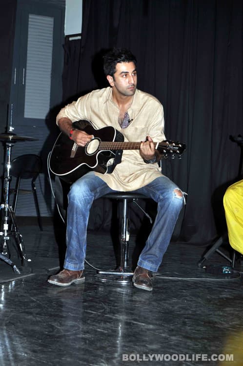 Ranbir strums the guitar 