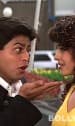 <b>What: </b> Main koi aisa geet gaaon (Yes Boss) <br>
<b>With whom: </b> Juhi Chawla<br>
<b>Where: </b> Switzerland<br>
Shahrukh and Juhi share a chemistry totally different from that SRK has with Kajol, Madhuri Dixit or Rani. The two have filmed several songs on the slopes of Switzerland, but the one we like is shot on the streets of a Swiss city. Shahrukh endears himself to us with his eyes and smile, but we always turn it off before the song ends. Why? ’Cause we hate to see how he litters a clean railway platform with all the things he has collected to woo the lady. If he didn’t want to hang on to them, he could have at least found a dustbin. Tch tch.
