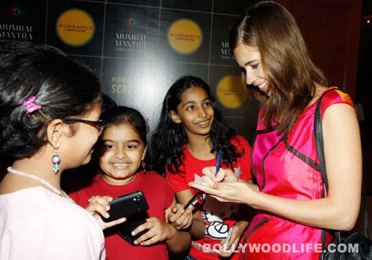 Kalki signs autographs 