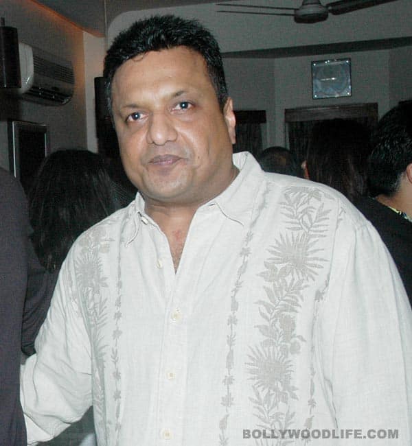 Why is Sanjay Gupta comparing himself to Karan Johar?