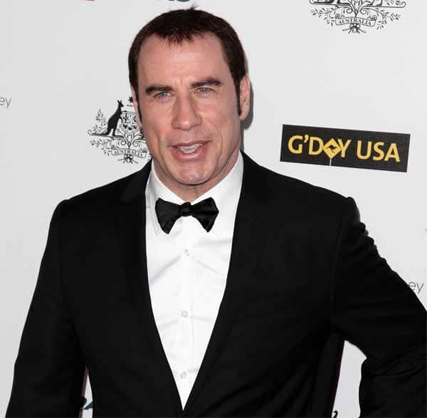What is John Travolta doing at the 15th IIFA awards? What is John Travolta doing at the 15th IIFA awards?