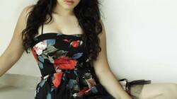 Who is Hansika Motwani going on a vacation with?
