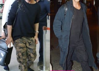 Shah Rukh Khan is FINALLY off his camouflage pants and we are totally digging his new airport style - view HQ pics Shah Rukh Khan is FINALLY off his camouflage pants and we are totally digging his new airport style - view HQ pics