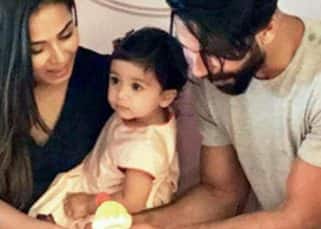 Finally we have a picture of Misha Kapoor cutting her FIRST birthday cake and it's too cute for words! Finally we have a picture of Misha Kapoor cutting her FIRST birthday cake and it's too cute for words!