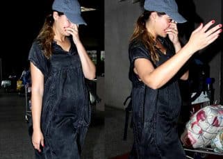 Is Nargis Fakhri Pregnant? Pics of the actress hiding her face at the airport have got us puzzled! Is Nargis Fakhri Pregnant? Pics of the actress hiding her face at the airport have got us puzzled!
