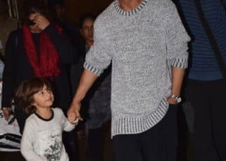Shah Rukh Khan and son AbRam make a stylish return to Mumbai - view pics Shah Rukh Khan and son AbRam make a stylish return to Mumbai - view pics