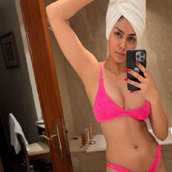 Jersey yıldızı Mrunal Thakur pembe bikinisiyle kıvrımlarını gözler önüne seriyor; gece yarısı isteklerini nasıl frenleyeceğini paylaşıyor