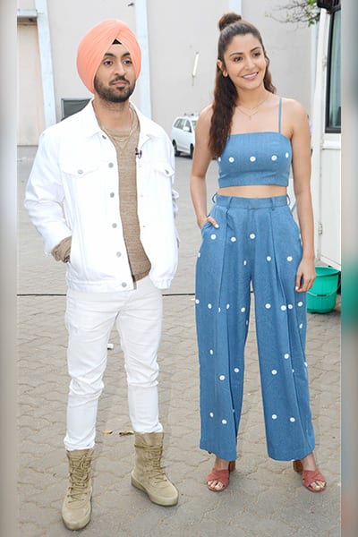 http://st1.bollywoodlife.com/wp-content/uploads/photos/anushka-sharma-and-diljit-dosanjh-looked-stylish-on-the-promotions-of-phillauri-in-the-city-201703-918216.jpg