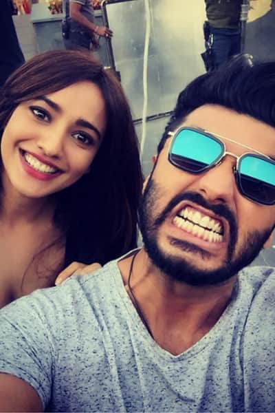 Arjun Kapoor posts a goofy picture with Neha Sharma during the shoot of Mubarakan