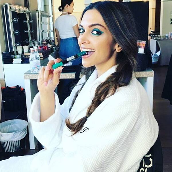 Deepika Padukone sports a dangerously bold smoky eye look for the press meet