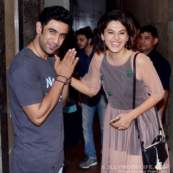 In this adorable picture, Amit Sadh joins hands in front of Taapsee Pannu as she laughs away.