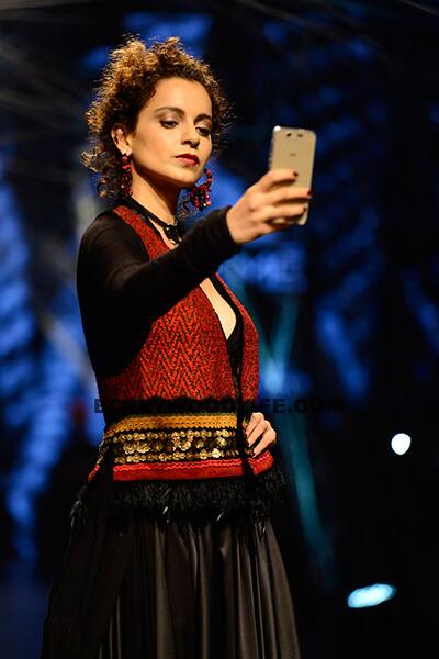 Kangana Ranaut posing for a selfie during Tarun Tahiliani’s show