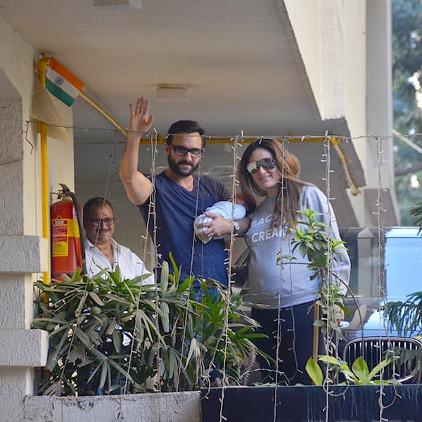 Kareena Kapoor and Saif Ali Khan posing with Taimur for the first time most certainly makes it the picture of the day
