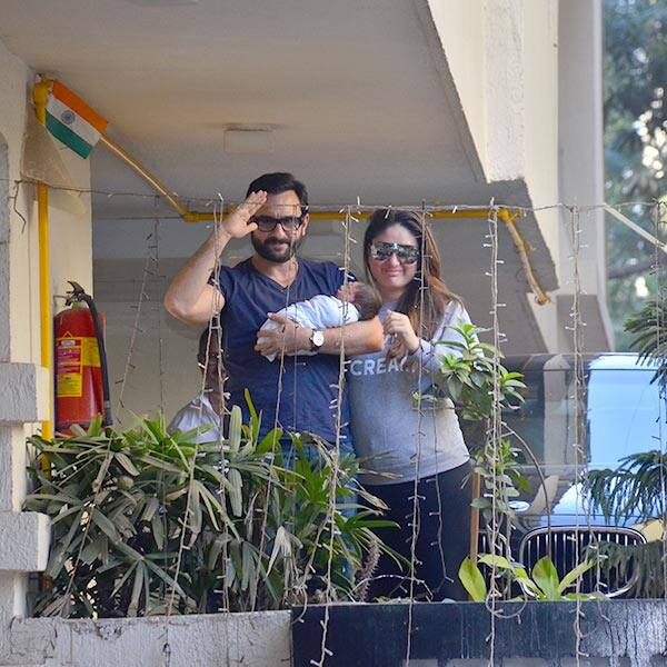 Kareena Kapoor Khan looks overwhelmed as she and Saif pose with their adorable baby Taimur