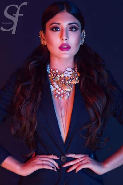 Kritika Kamra poses in black jacket during photo shoot