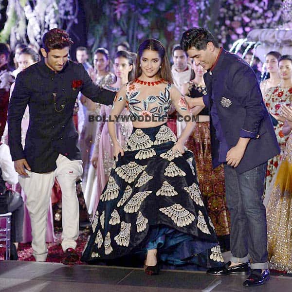 Manish and Sushant helping Shraddha to step on the ramp Manish and Sushant helping Shraddha to step on the ramp