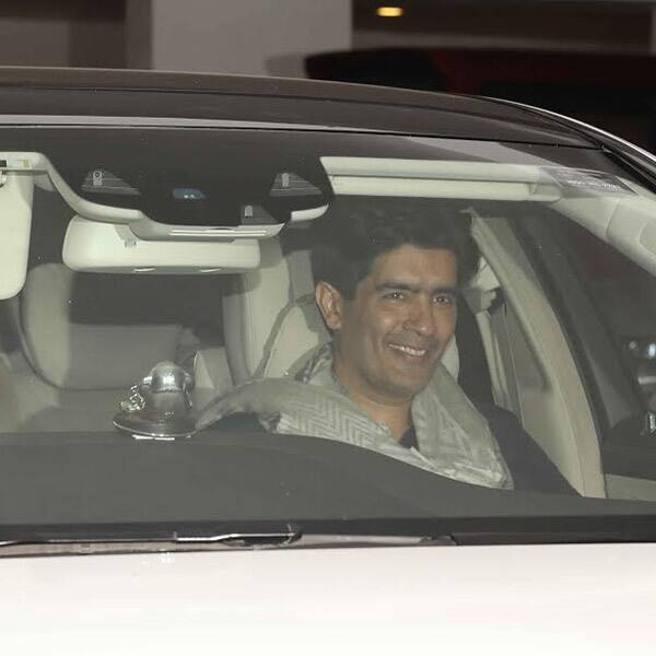 Manish Malhotra looks stunning as he was spotted in the car outside Karan Johar's residence