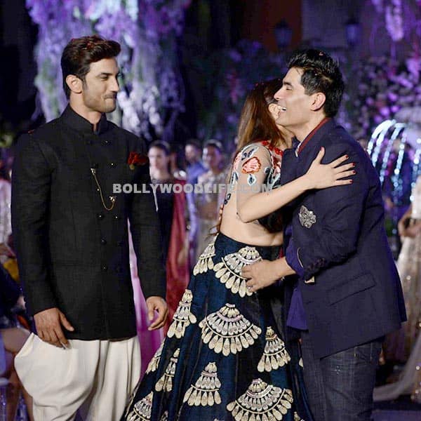 Shraddha Kapoor greeting Manish Malhotra during the show Shraddha Kapoor greeting Manish Malhotra during the show
