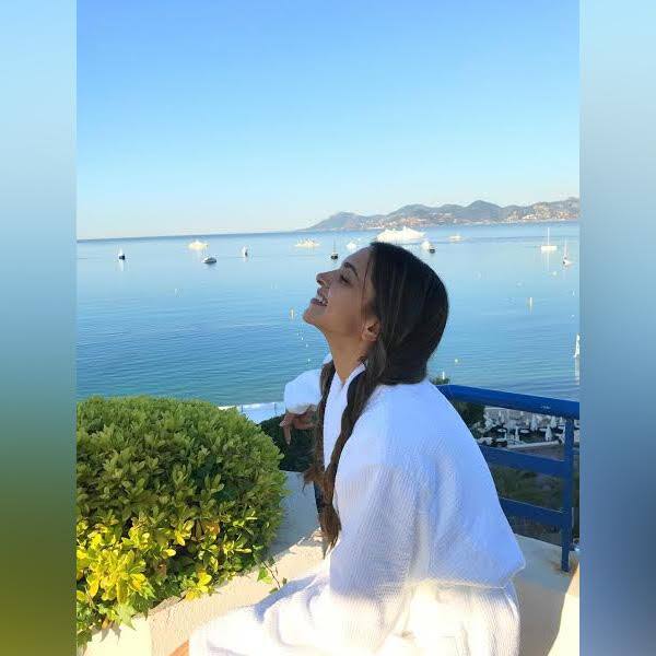 This picture of Deepika Padukone as she soaks up the sun at Cannes is adorable