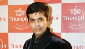 Is Karan Johar trying to hide his double chin?