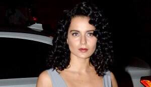 Kangna Ranaut spices up her dull grey dress by showing off a lacy bra