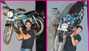 John Abraham throws a&nbsp;bike!