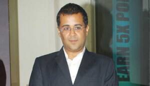 Malaika Arora Khan and Chetan Bhagat at the launch of Mercedes Benz magazine