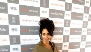 Mallika Sherawat spotted in a Victoria Beckham dress at Cannes