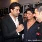 What is Abhishek Bachchan saying to Shahrukh&nbsp;Khan?