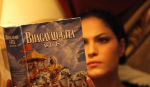 Veena Malik turns spiritual, reads the Bhagavad Gita!
