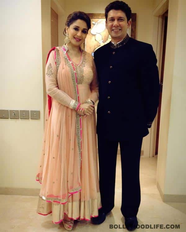 Madhuri Dixit With Her Husband 130813 
