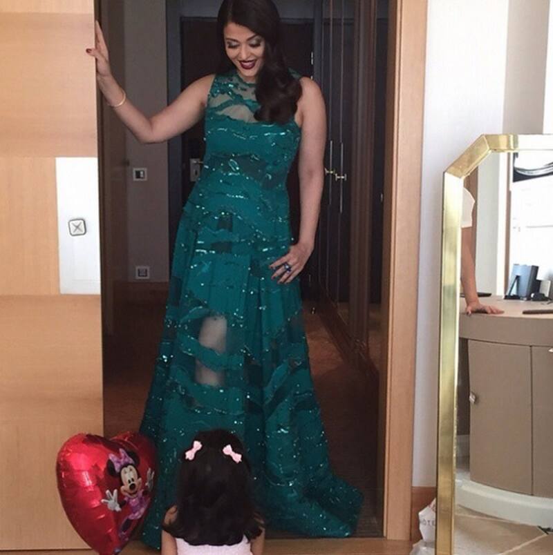 Sneak Peak: Aaradhya Bachchan digs her mommy Aishwarya Rai Bachchan's red carpet look for 68th Cannes Film Festival!
