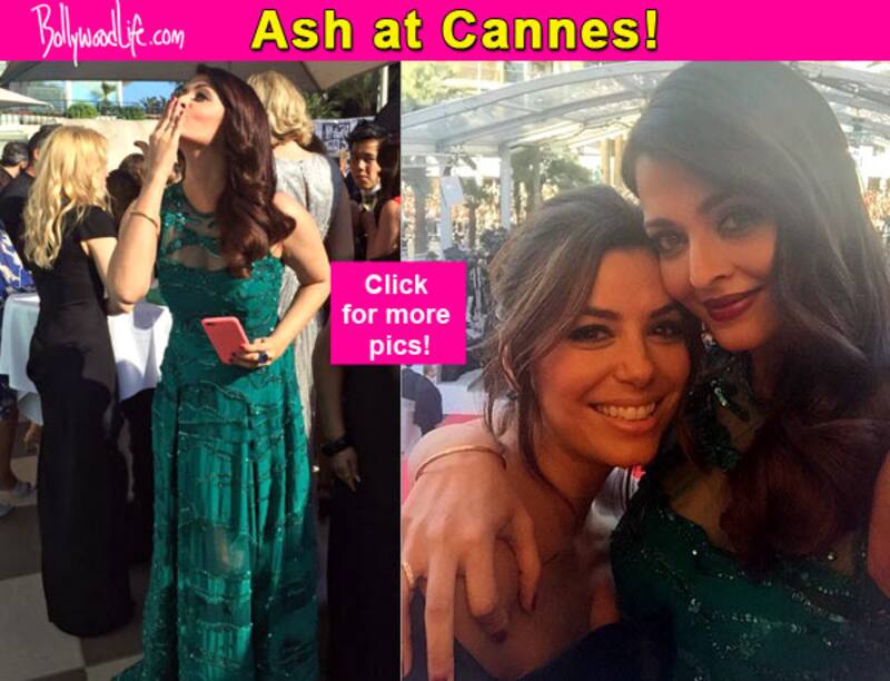From blowing kisses to clicking selfies with Eva Longoria, Aishwarya Rai Bachchan sends fans in a tizzy with her red carpet appearance at Cannes 2015!