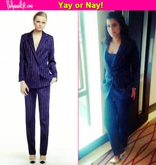 Kajol aces the stripped pant suit for the Dilwale promotions in London - view pic!