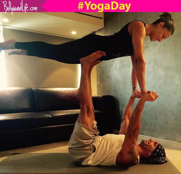 Hot damn! Look how Bipasha and Karan Singh Grover are turning up the HEAT on Yoga day - view&nbsp;pic!