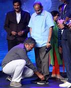 This picture of SS Rajamouli tying his father Vijayendra Prasad's shoelace is going viral - view pic