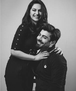 Fawad Khan poses with wife Sadaf for a romantic photoshoot and gently reminds everyone that he is taken!