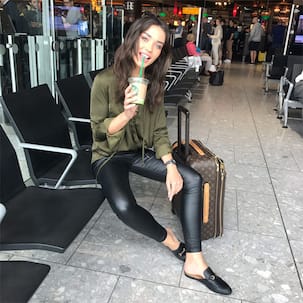 Amy Jackson leaves for Cannes 2017; looks chic sipping on coffee