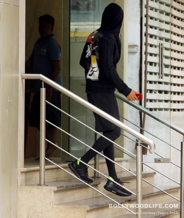 Ranbir Kapoor hides in his hoodie
