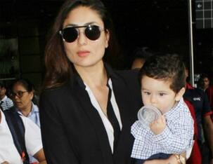 This picture of Taimur Ali Khan trying to comb his hair is way too cute to handle - view pic
