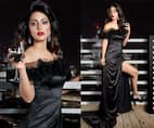 Hina Khan looks resplendent in a black slit gown and we can't help admiring her look - view pic