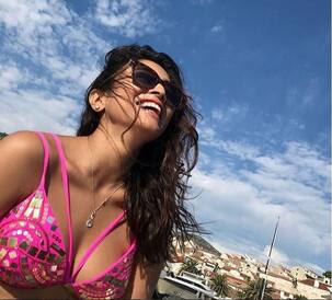 Sorry Shriya Saran but can we borrow this pink studded monokini of yours?