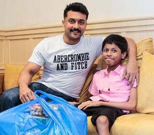 [PHOTOS] Suriya meets an ailing little fan and proves how much he loves his admirers