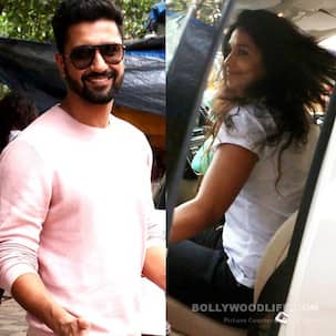 Vicky Kaushal gives a thumbs up to paparazzi as alleged girlfriend Harleen Sethi rushes towards the car - view pics