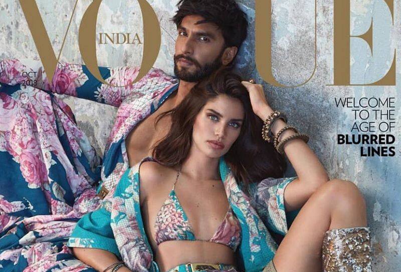 The floral prints maybe a distraction, but Ranveer Singh and Sara Sampaio's arresting hot gaze steals the show in this Vogue cover